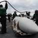 USS George H.W. Bush sailors move fuel tank