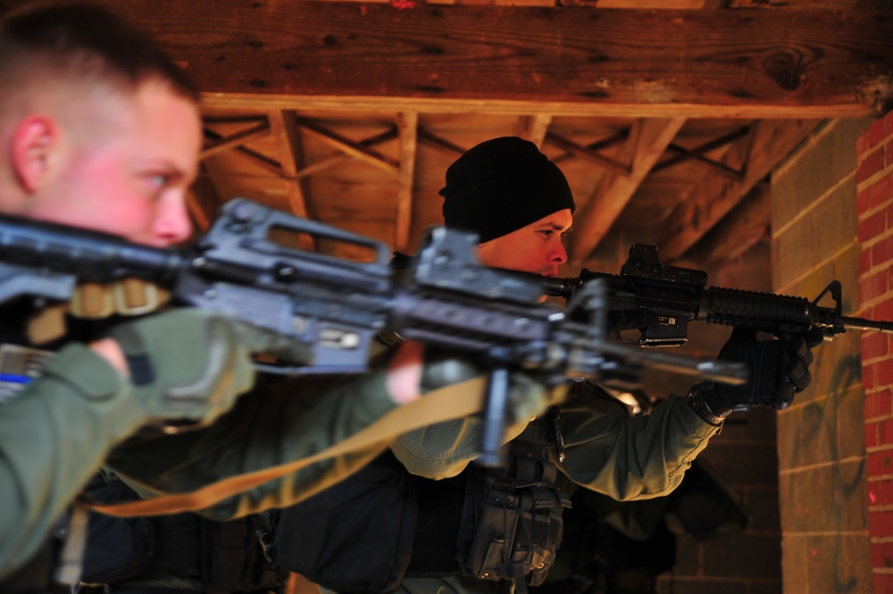 Marines and officers practice active shooter training at combat town