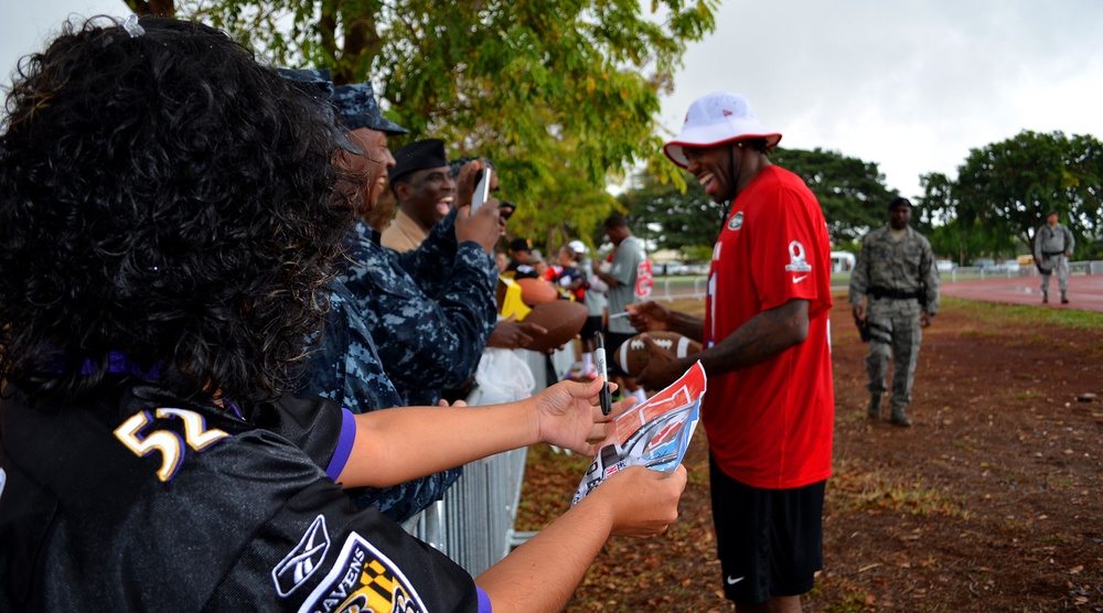 Service members get close and personal with NFL players