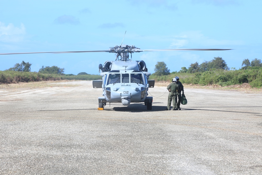 Navy Seahawk lands at Tinian North Field