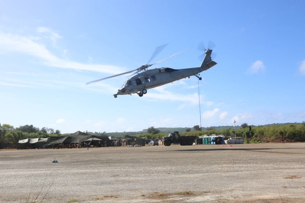 Navy Seahawk lands at Tinian North Field