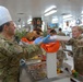 Senior officers serve Thanksgiving meals at Bagram Air Field