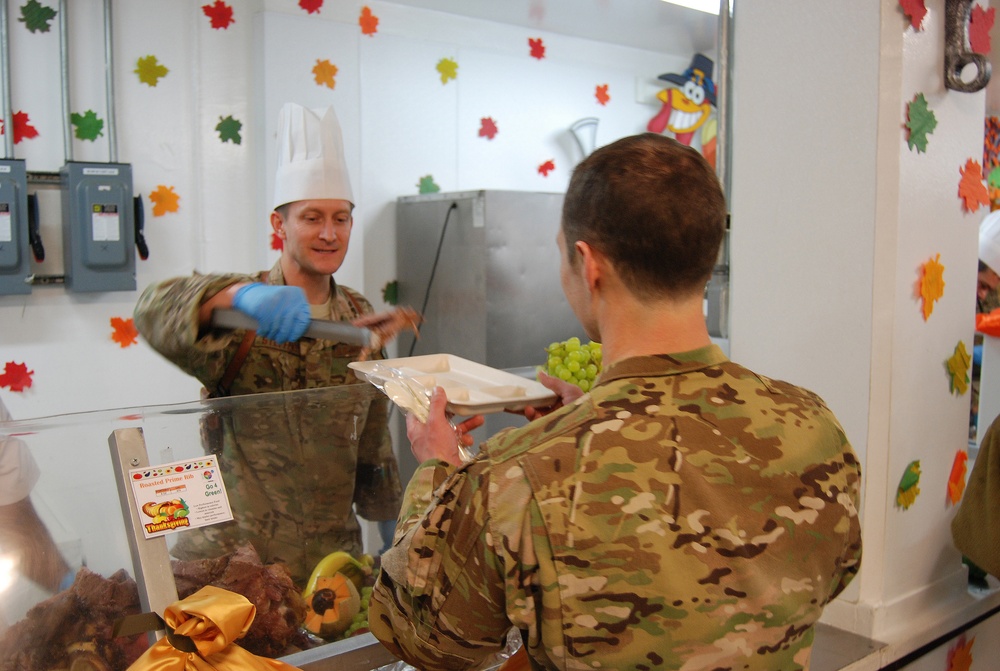 Senior officers serve Thanksgiving meals at Bagram Airfield