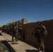 Coalition force members provide security during Helmand province operation