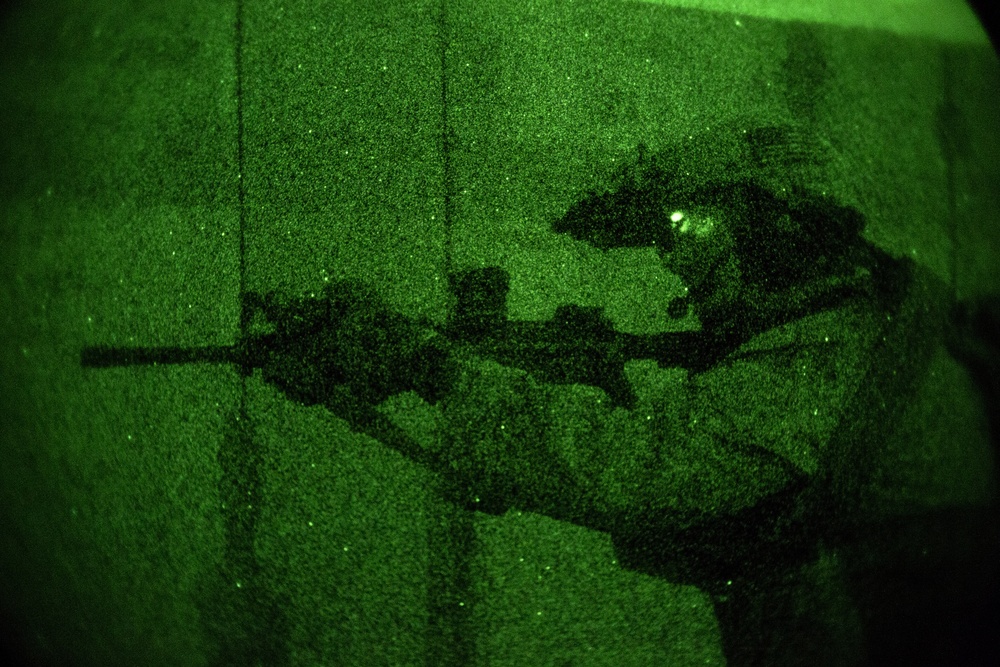 U.S. Marines conduct night raid operations training