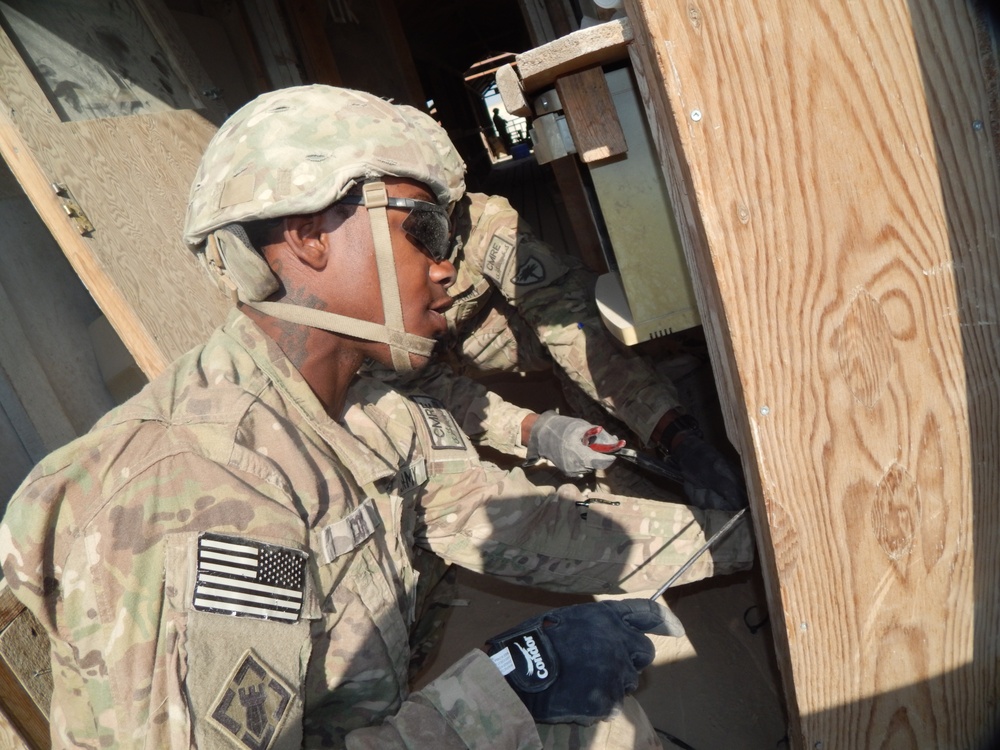 82nd SB-CMRE troops deconstruct former Canadian prison compound in Afghanistan