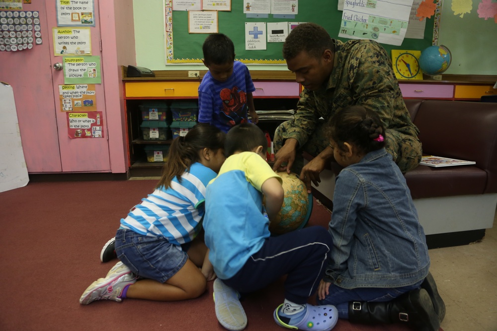 Service members volunteer at Tinian Elementary School
