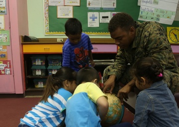 Service members volunteer time at Tinian Elementary School