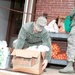 Falmouth Service Center, OCAC and Chaplains donate dozens of Thanksgiving fixings to wing members