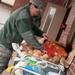 Falmouth Service Center, OCAC and Chaplains donate dozens of Thanksgiving fixings to wing members