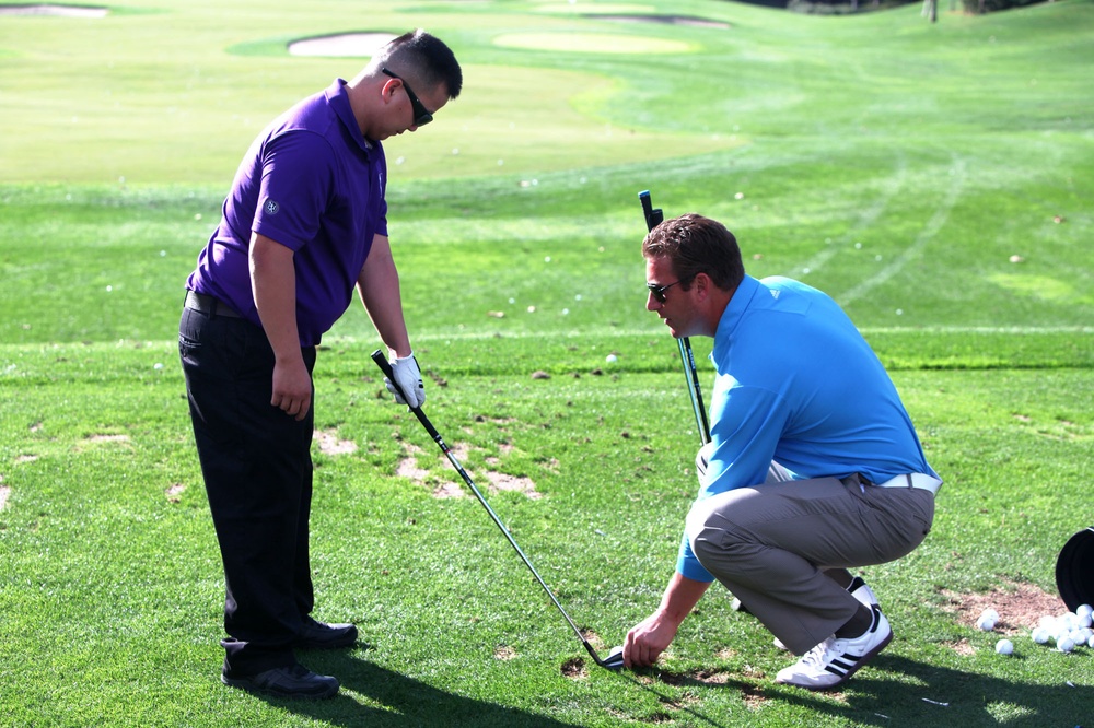 Wounded Marines rehab with pro golf help