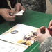 JGSDF members teach origami to US service members