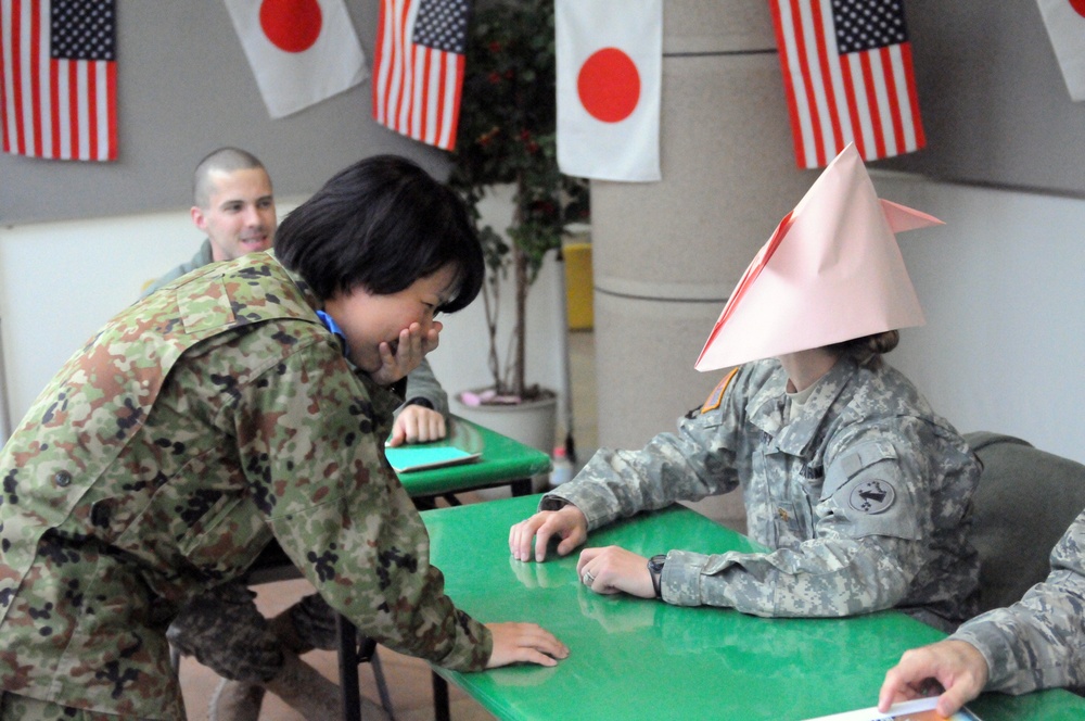 JGSDF members teach origami to US service members