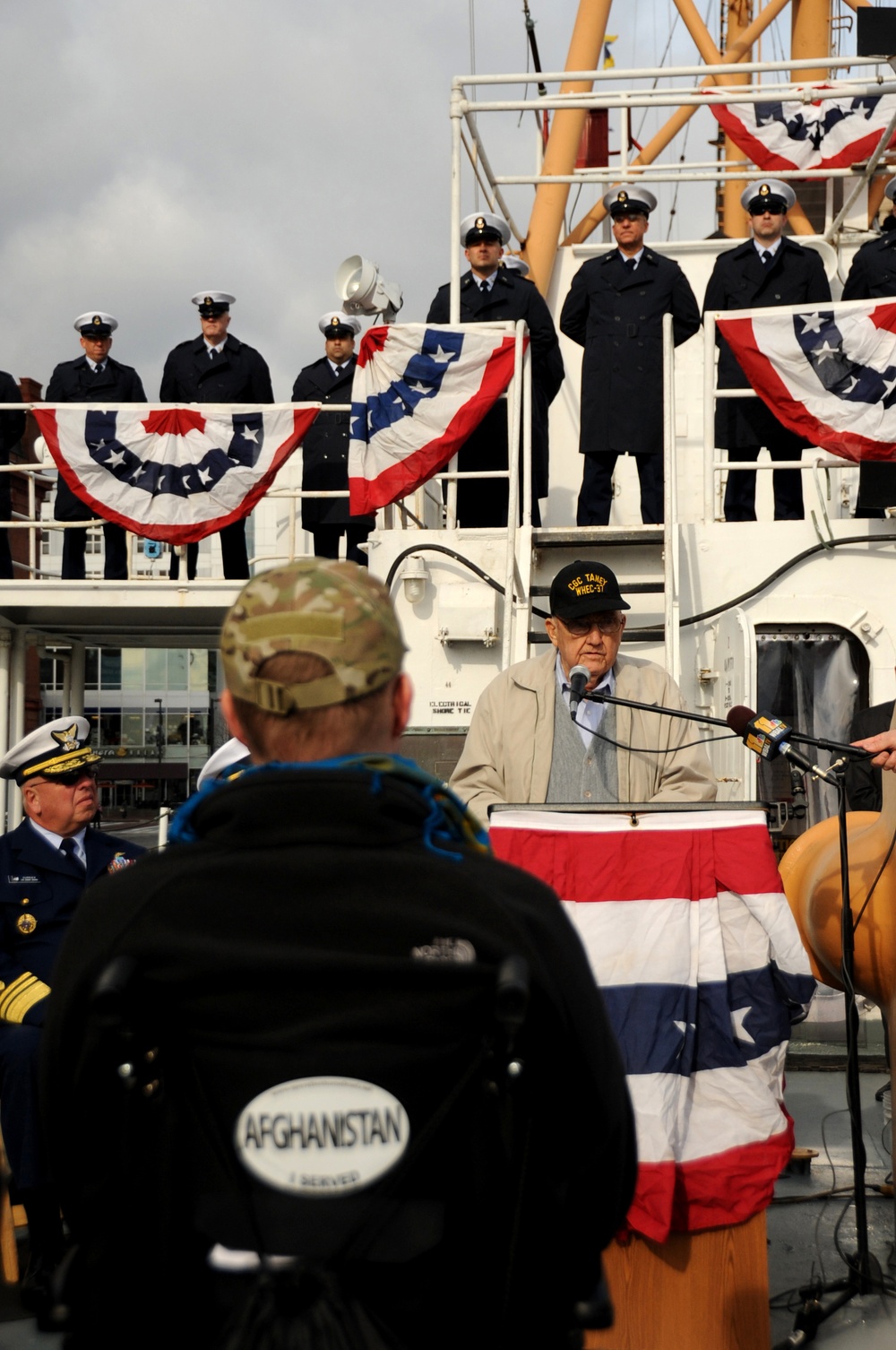 Coast Guard veteran James Kitchen addresses the crowd during a Pearl Harbor memorial ceremony