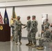 Lt. Col. Timothy A. Brooks congratulates Command Sgt. Maj. Anthony F. Mainiero during a Change Of Responsibility ceremony