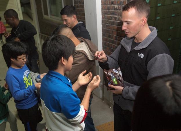 Fighter Attack squadrons help orphanage in Korea during Max Thunder