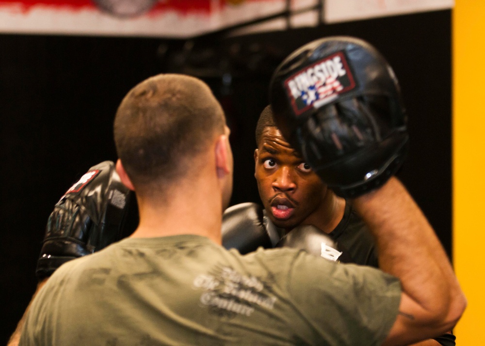 Fort Bragg combatives instructor preps for 2013 Fort Bragg Army Combatives Championship Invitational