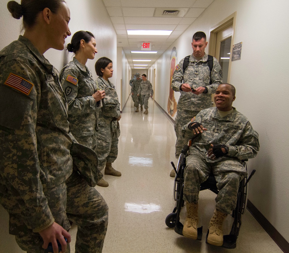 Gregory speaks to soldiers his first day back