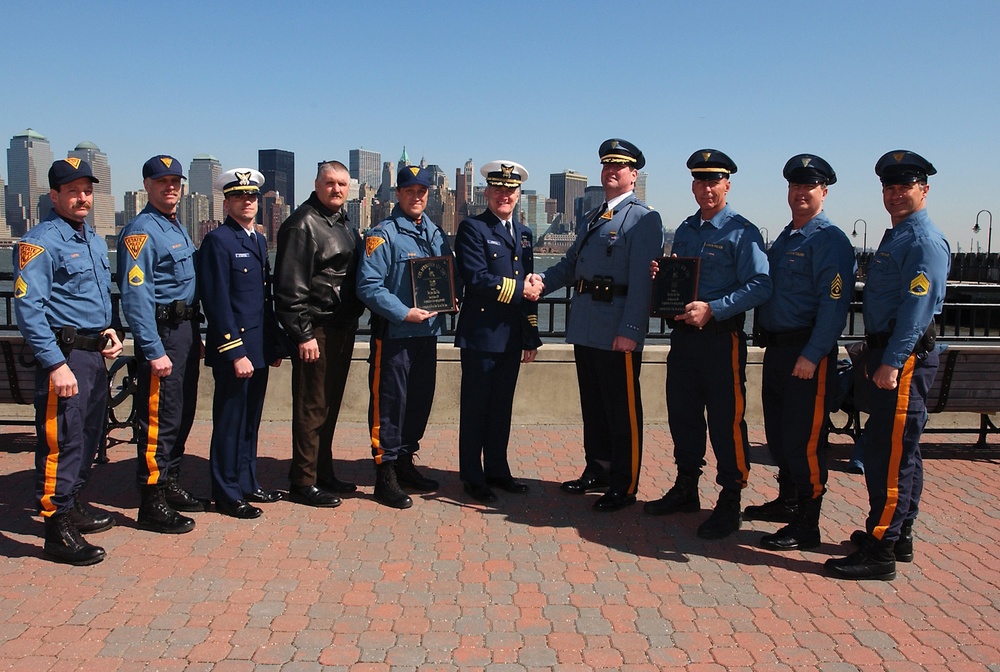 Coast Guard Activities New York members, New Jersey State Police troopers pose for photo