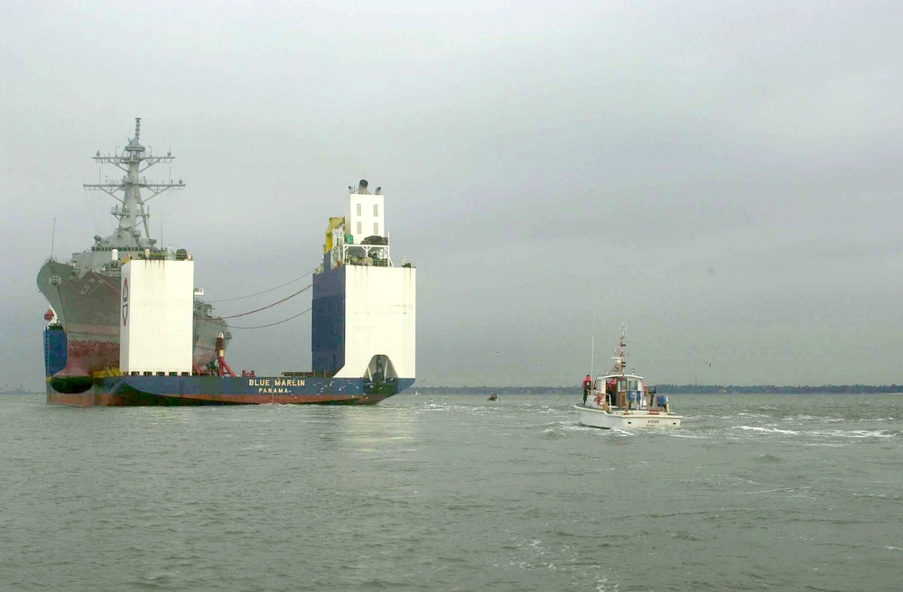 USS Cole aboard the Blue Marlin escorted into a US port