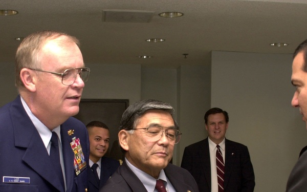 Secretary Norman Mineta and Commandant Loy check IDs