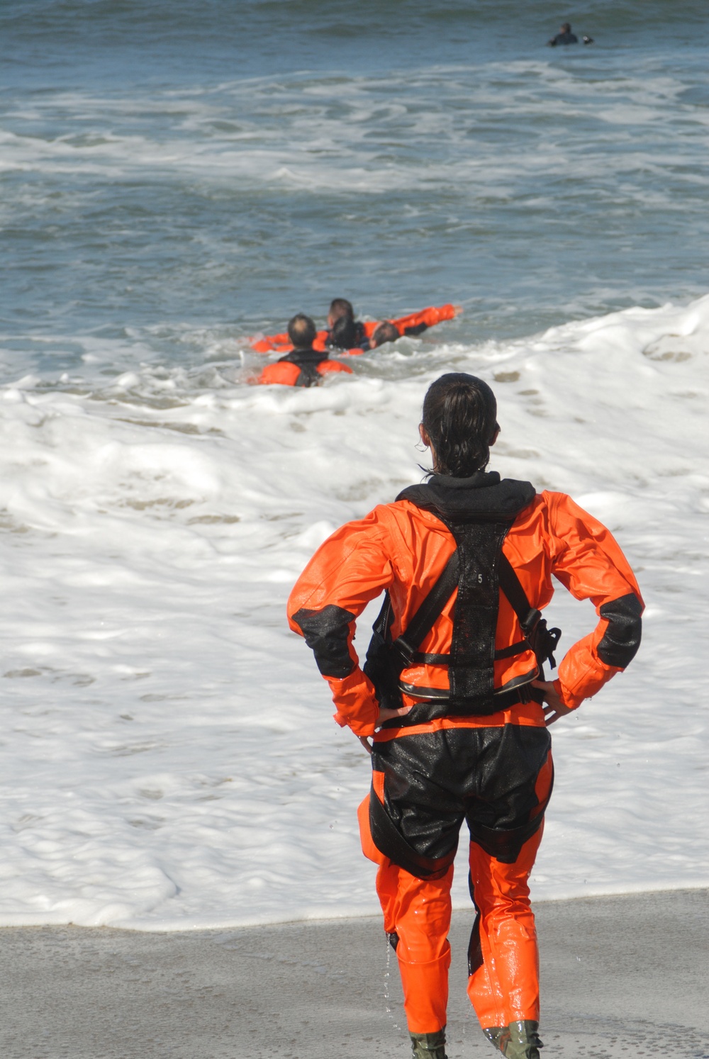 AN Rebekah Cabral watches from the shore