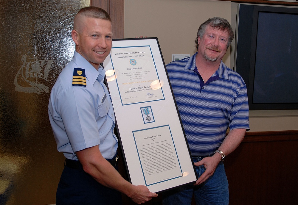 SEATTLE (Jan. 8, 2008) Captain Marc Lashua is presented to the Coast Guard Meritorious Public Service Award for his role as capt