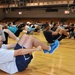 Fitness fiends pack basketball court for P90X workout