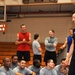 Fitness fiends pack basketball court for P90X workout