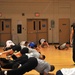 Fitness fiends pack basketball court for P90X workout