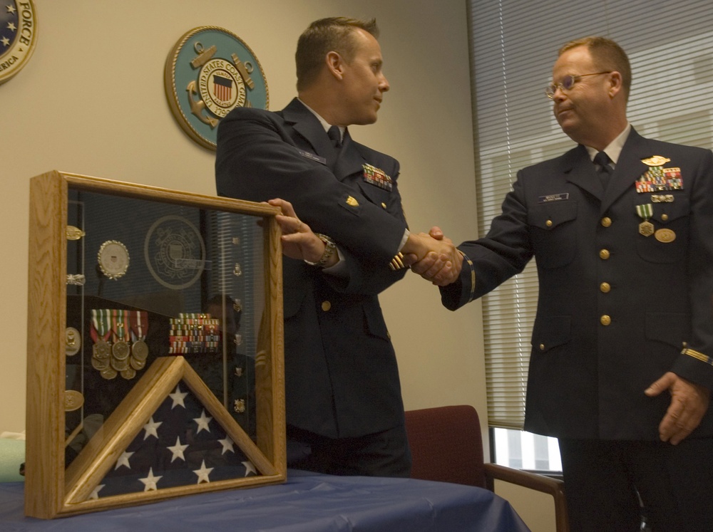 CWO Randy Midgett Recieves Shadow Box