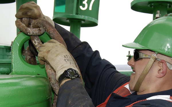 CGC Buckthorn crewman preparing buoy