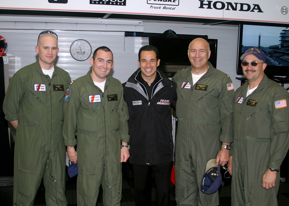 INDY 500 RACER POSES WITH AIRCREW