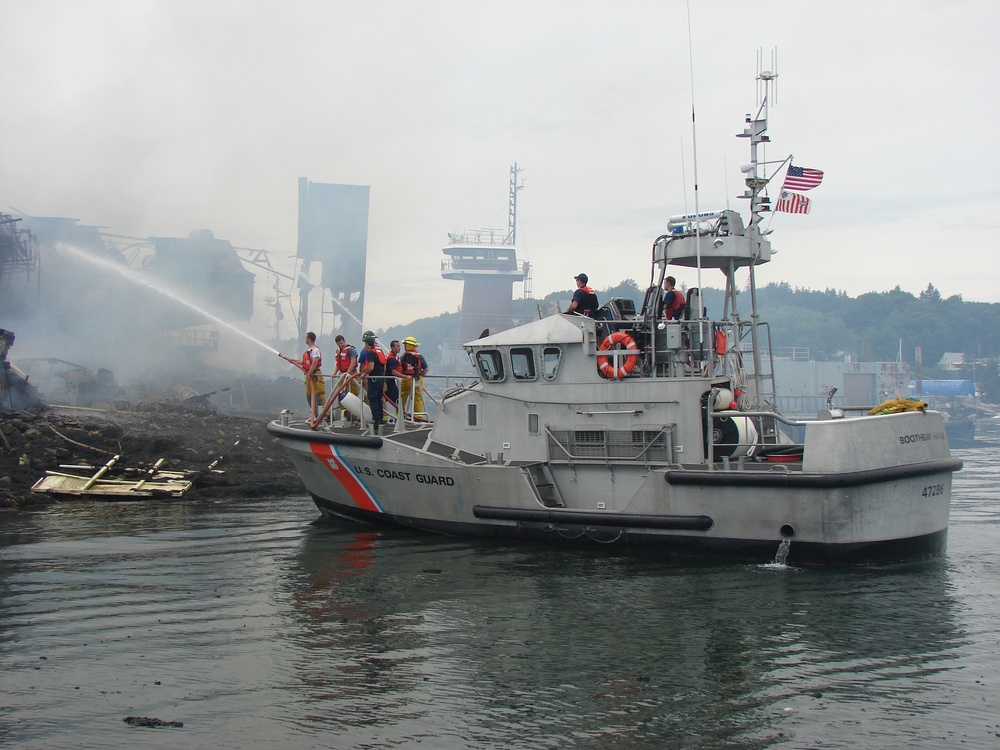 Coast Guard helping fire department extinguish shipyard blaze