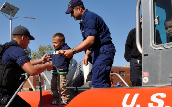 Coast Guard Island Holds Month of Miliatry Child Carnival 090424-G-9417H-036
