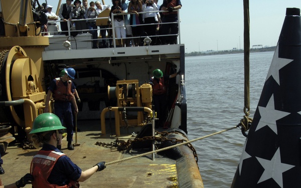 Lowering the Francis Scott Key buoy