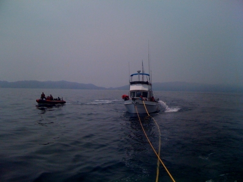 Coast Guard Cutter Narwhal and partner agencies respond to vessel taking on water