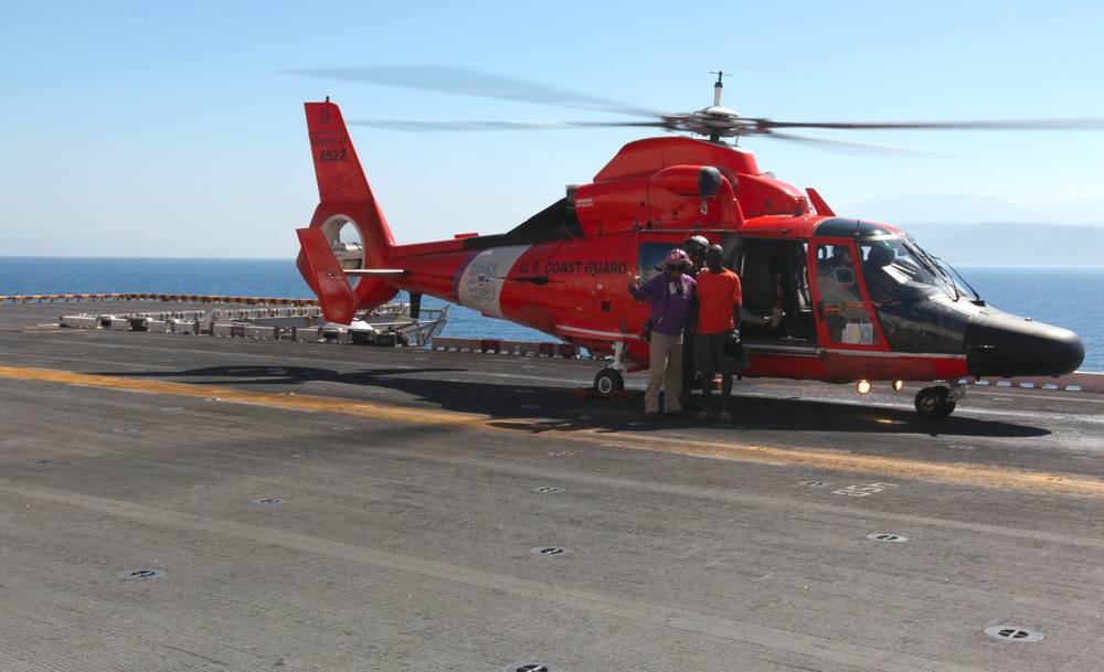 Coast Guard delivers patients to USS Bataan