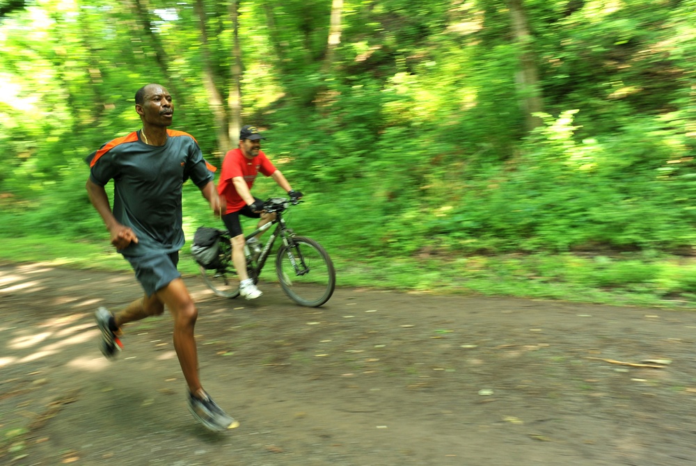 Participants run during the 12th Annual Tom