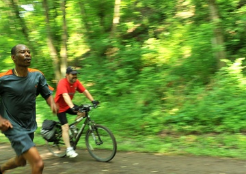 Participants run during the 12th Annual Tom