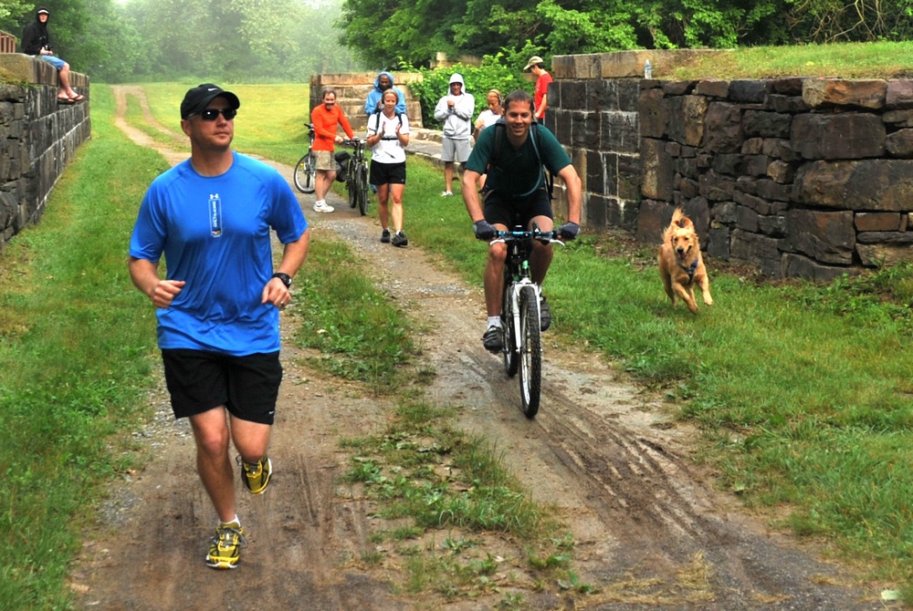 Participants run during the 12th Annual Tom