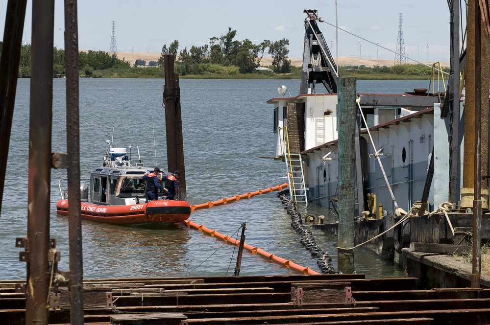 Dredge barge Headway partially sinks