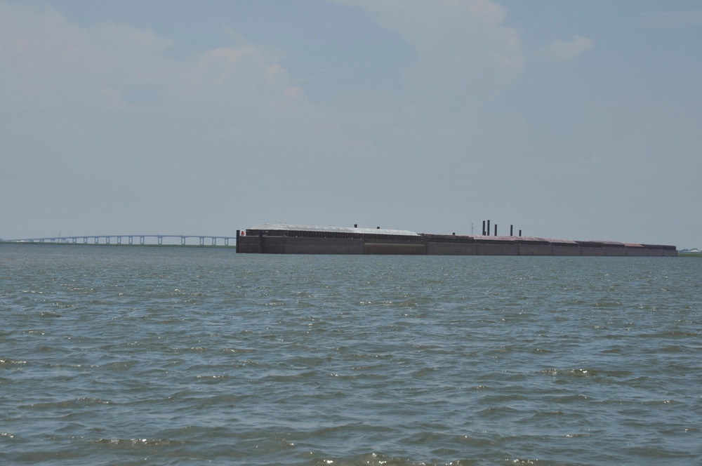 Barges act as massive boom