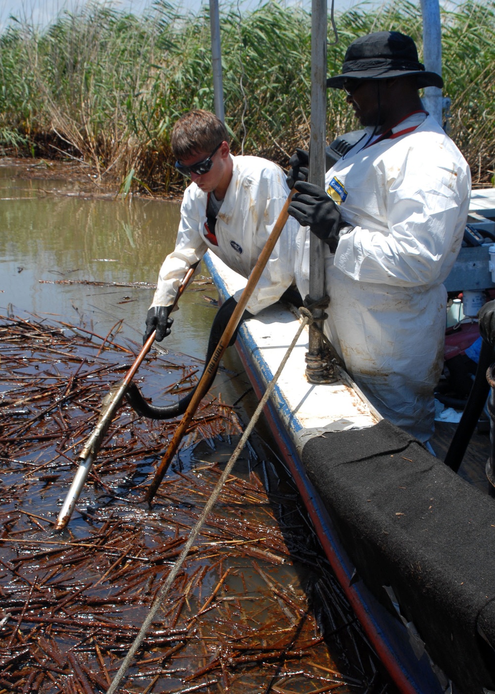 Vacuuming oil and debris