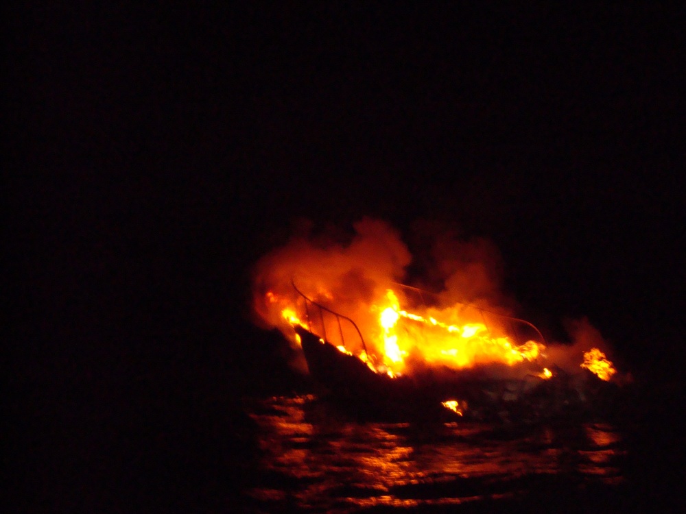 Boat burns after Coast Guard rescues 11 from burning boat
