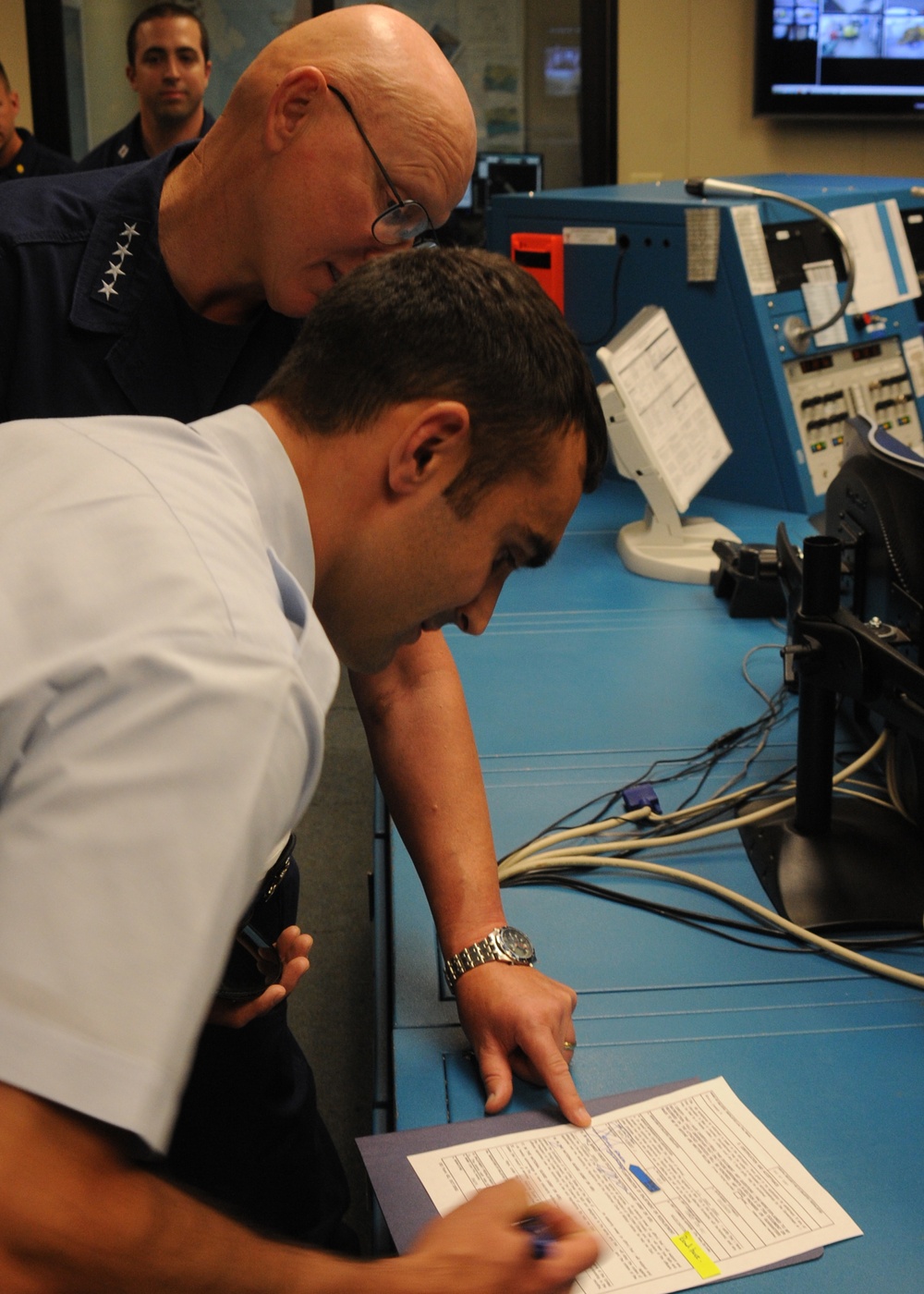 Coast Guard Commandant Adm. Papp conducts re-enlistment ceremony