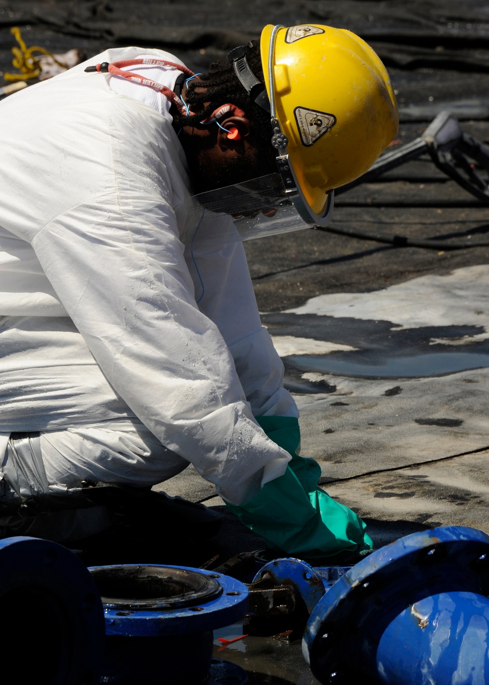 Contract worker on Grand Isle cleaning facility