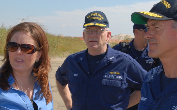 Admirals with news media on Grand Isle