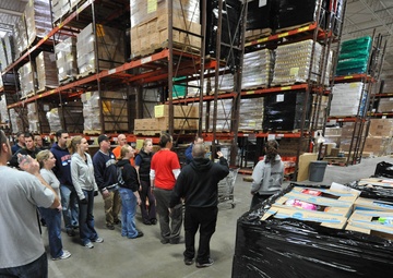Volunteers assist food bank