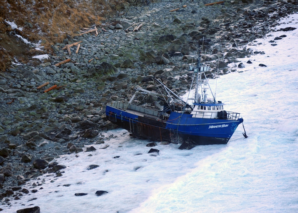 Coast Guard survey's aground fishing vessel Midnite Sun